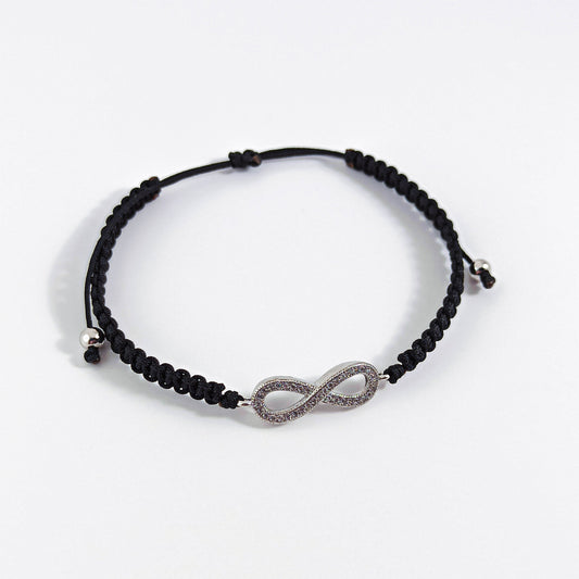 Bracelet en macramé noir avec signe illimité