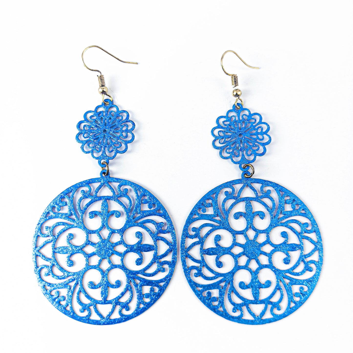 Boucles d'oreilles scintillantes en filigrane bleu